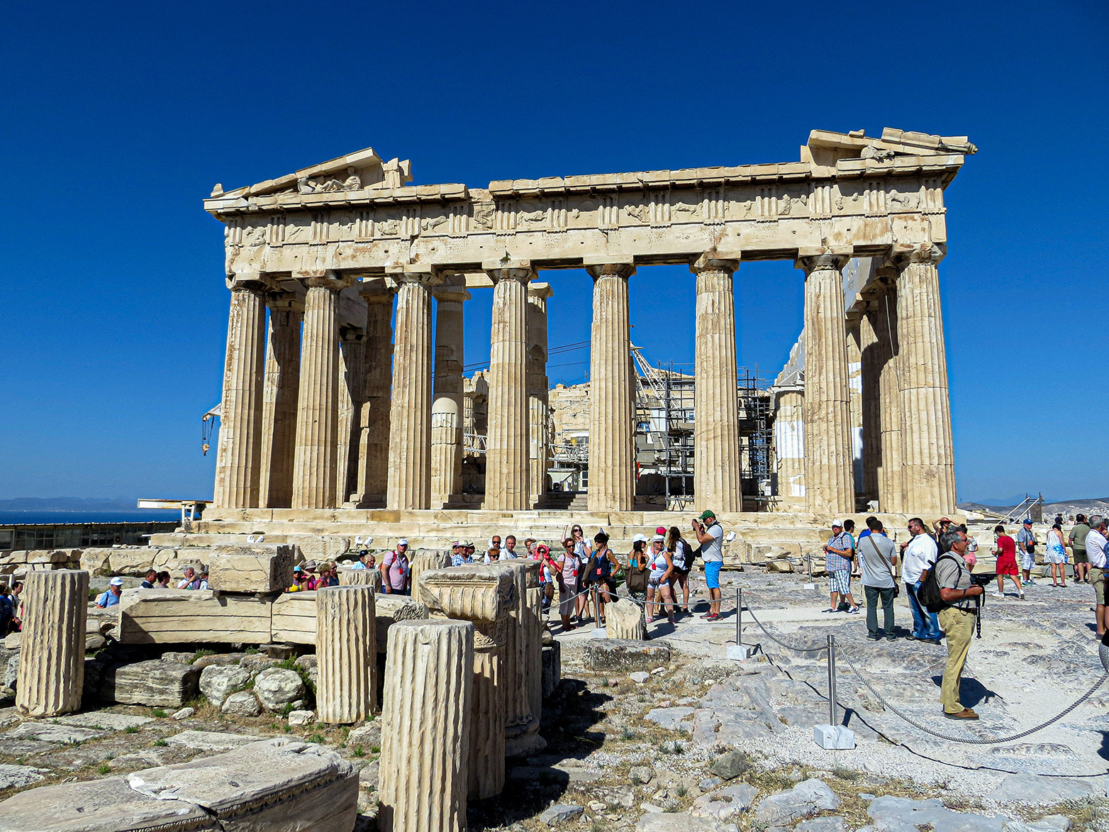 Acropolis, the Parthenon East facade of the temple with eight tall, fluted columns in the Doric style, architrave, frieze and cornice.
